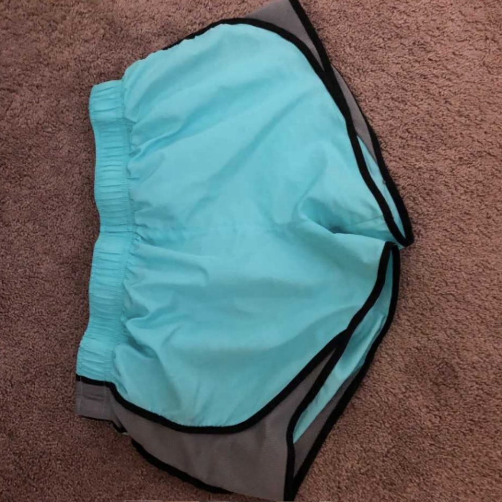Bright teal workout shorts